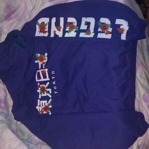 Popular poison hoodie ,XL . Purple and white.